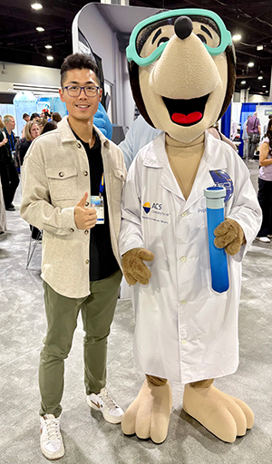 Dr. Yinghao Wen with a costumed character