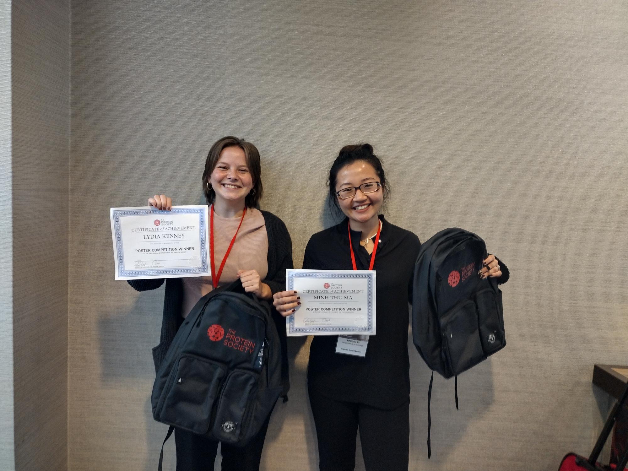 Lydia Kenney (left) and Mihn Thu (Alice) Ma show off their best poster awards won at the Protein Society Symposium in July. (Photo courtesy Raquel Lieberman)