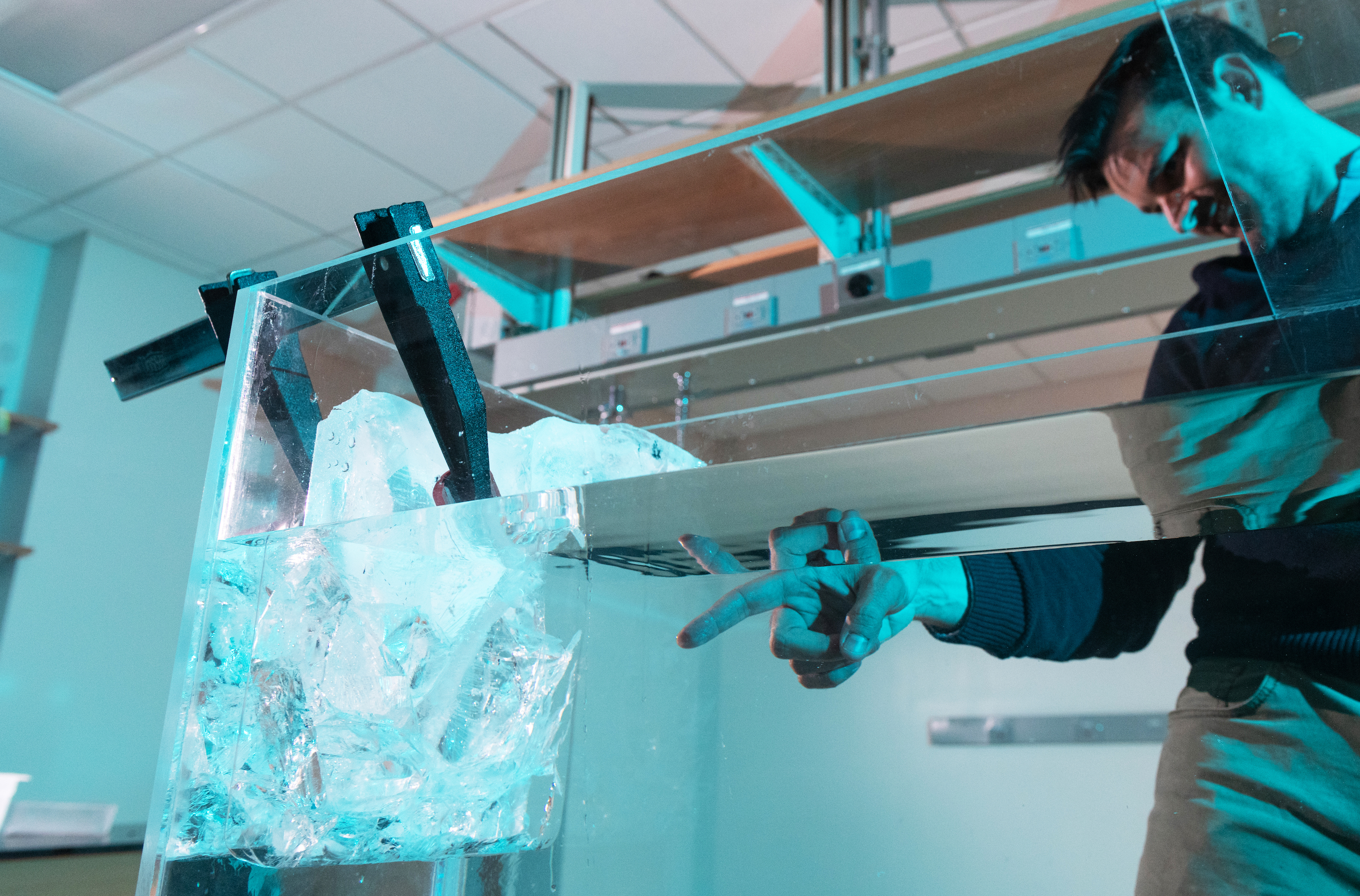 Alexander Robel with an ice experiment in his lab. 