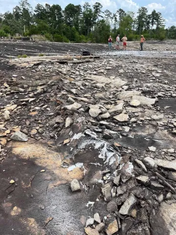 July 2023: A long line of scattered rocks indicate a fresh fault in the outcrop within the Davidson-Arabia Mountain Nature Preserve. (Photo: Arabia Mountain National Heritage Area)