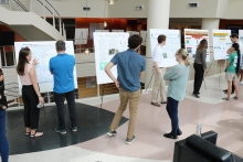 Students attending the Aquatic Chemical Ecology REU prepare for poster session presentations July 20. (Photo Renay San Miguel)