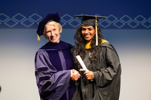Dean Lozier congratulates a newly minted College of Sciences alum.